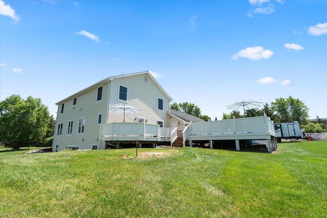 7350 N Territorial Rd, Dexter, MI 48130 - rear view of property with a wooden deck, a lawn, and a shed
