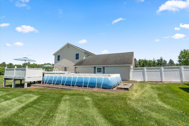 7350 N Territorial Rd, Dexter, MI 48130 - back of house featuring a deck