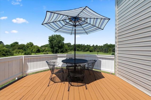 7350 N Territorial Rd, Dexter, MI 48130 - wooden deck with outdoor dining area