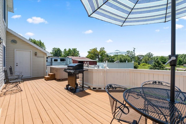 7350 N Territorial Rd, Dexter, MI 48130 - wooden deck with area for grilling and outdoor dining space