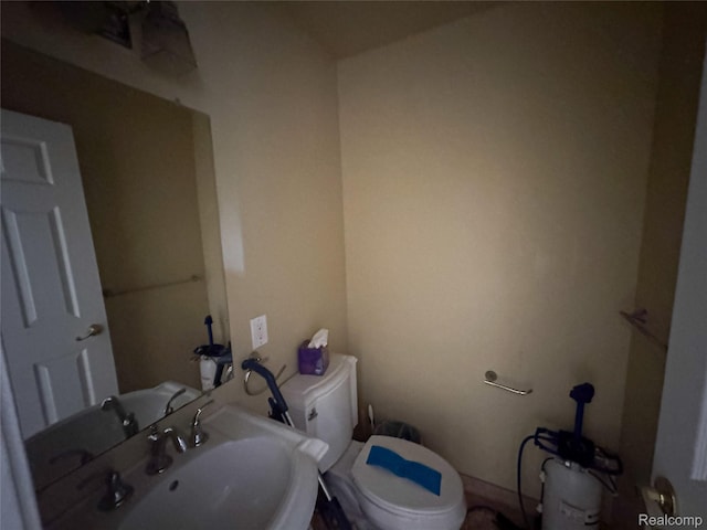 7950 Pinckney Rd, Pinckney, MI 48169 - half bathroom with toilet and a sink