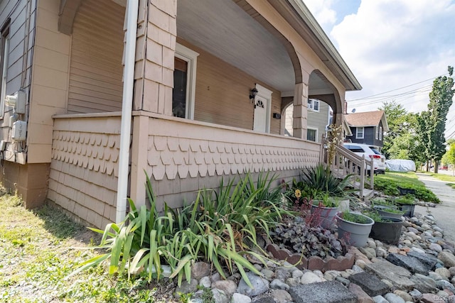 422 S Winter St, Adrian, MI 49221 - view of property exterior featuring a porch