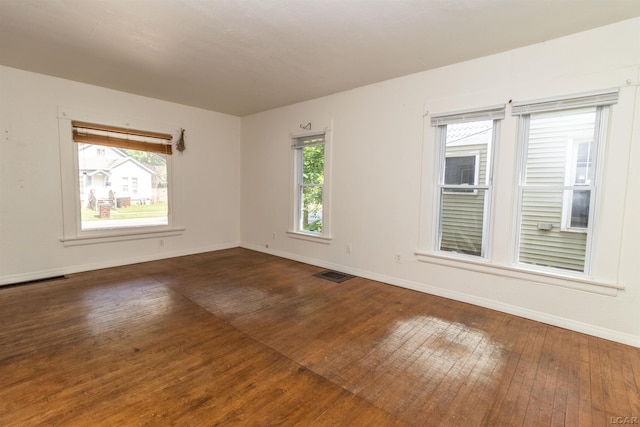 422 S Winter St, Adrian, MI 49221 - empty room with hardwood / wood-style flooring