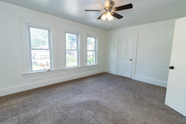 422 S Winter St, Adrian, MI 49221 - carpeted spare room featuring ceiling fan and baseboards