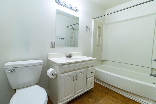 422 S Winter St, Adrian, MI 49221 - bathroom with vanity, shower / tub combination, and wood finished floors