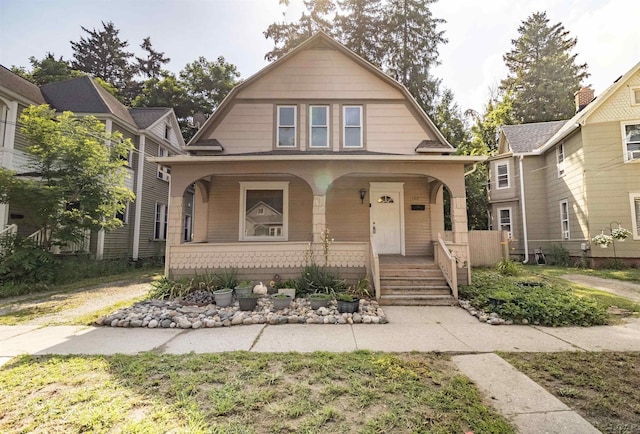 422 S Winter St, Adrian, MI 49221 - dutch colonial featuring a gambrel roof and covered porch