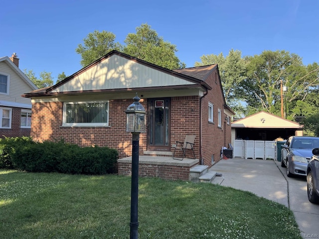 3841 Westpoint St, Dearborn, MI 48124 - bungalow with a front yard, brick siding, and a detached garage