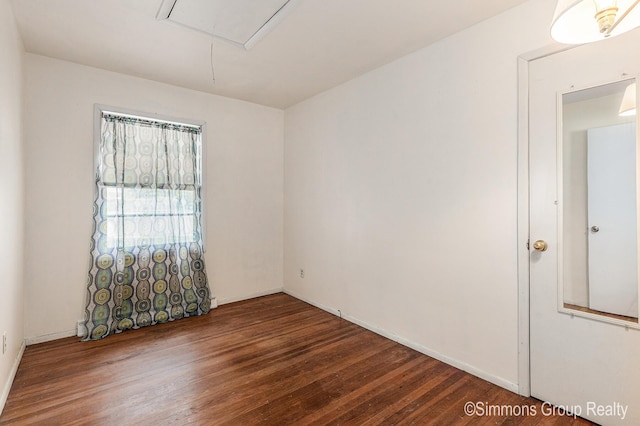 252 Jeffrey St, Cedar Springs, MI 49319 - unfurnished room with attic access and wood finished floors