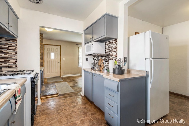 252 Jeffrey St, Cedar Springs, MI 49319 - kitchen with white appliances, gray cabinetry, decorative backsplash, and light countertops