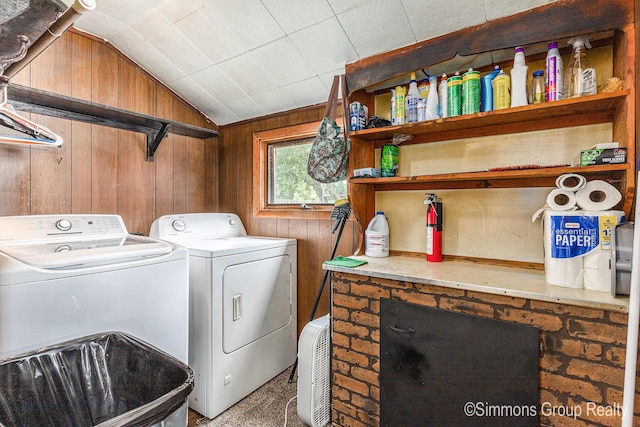 252 Jeffrey St, Cedar Springs, MI 49319 - laundry room with separate washer and dryer and wood walls