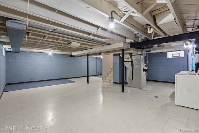 22951 Audette, Dearborn, MI 48124 - below grade area with washer / clothes dryer, stairway, concrete block wall, tile patterned floors, and heating unit