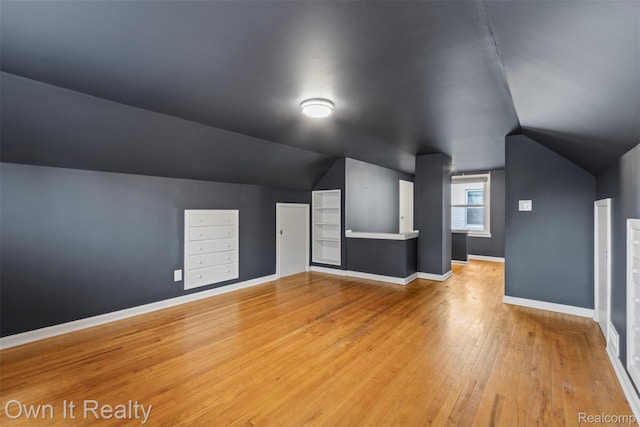 22951 Audette, Dearborn, MI 48124 - bonus room featuring vaulted ceiling, hardwood / wood-style flooring, and built in features