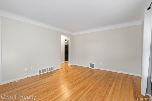 22951 Audette, Dearborn, MI 48124 - unfurnished room with light wood-style flooring and baseboards