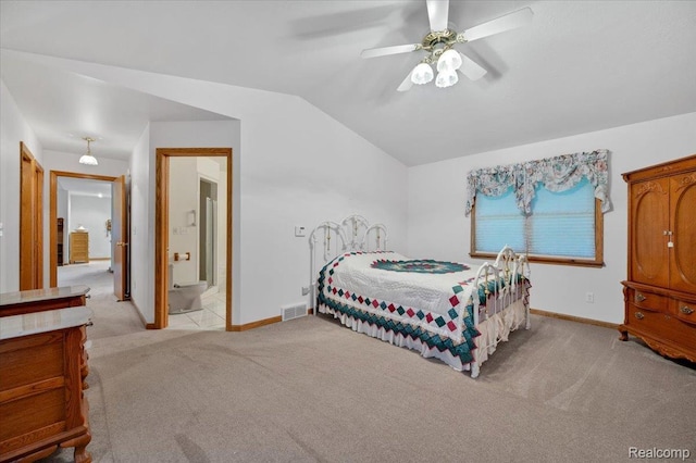 1829 Farnsworth Rd, Lapeer, MI 48446 - bedroom with light colored carpet, vaulted ceiling, ensuite bath, and ceiling fan