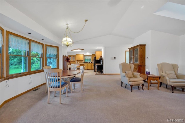 1829 Farnsworth Rd, Lapeer, MI 48446 - dining room with light carpet, vaulted ceiling, and a chandelier