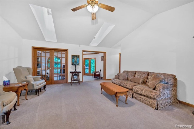 1829 Farnsworth Rd, Lapeer, MI 48446 - living room featuring a skylight, carpet, vaulted ceiling, ceiling fan, and french doors
