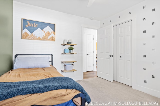 3520 Auburn Ave NE, Grand Rapids, MI 49525 - bedroom with carpet floors, a closet, and ceiling fan