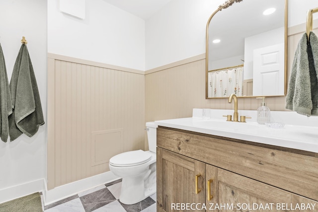 3520 Auburn Ave NE, Grand Rapids, MI 49525 - full bath featuring vanity and a wainscoted wall