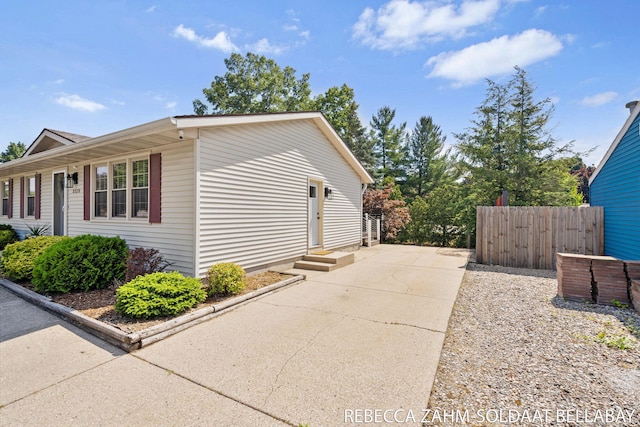 3520 Auburn Ave NE, Grand Rapids, MI 49525 - view of home's exterior with concrete driveway