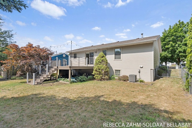 3520 Auburn Ave NE, Grand Rapids, MI 49525 - rear view of property with a fenced backyard, stairs, and a wooden deck
