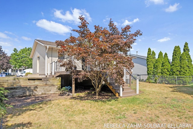 3520 Auburn Ave NE, Grand Rapids, MI 49525 - back of property featuring stairway and a wooden deck