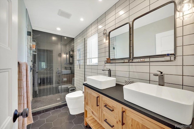 5612 Northcrest Xing, Clarkston, MI 48346 - full bathroom featuring tile walls, tile patterned flooring, a stall shower, double vanity, and recessed lighting