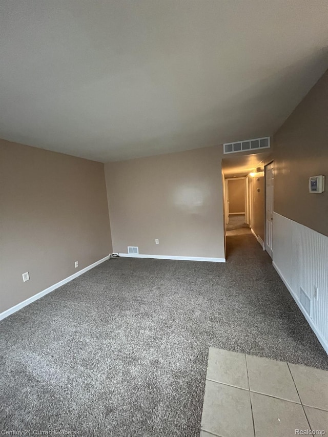 6179 Sylvia St, Taylor, MI 48180 - carpeted spare room with baseboards