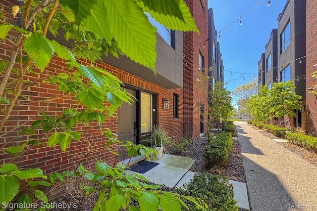 2037 11th St Unit 3, Detroit, MI 48216 - view of side of property with brick siding