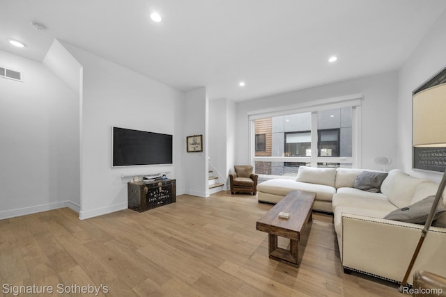 2037 11th St Unit 3, Detroit, MI 48216 - living area featuring light wood finished floors, stairway, and recessed lighting