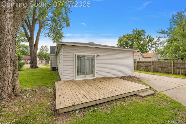 5869 Marvin St, Taylor, MI 48180 - back of property featuring a wooden deck and a shingled roof