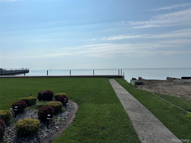 104 Lac Sainte Claire Dr, Saint Clair Shores, MI 48082 - view of green lawn featuring a water view