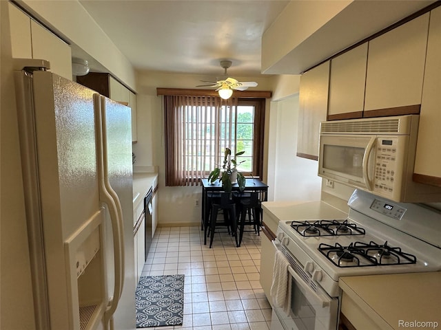 104 Lac Sainte Claire Dr, Saint Clair Shores, MI 48082 - kitchen with white appliances, ceiling fan, light countertops, and light tile patterned floors