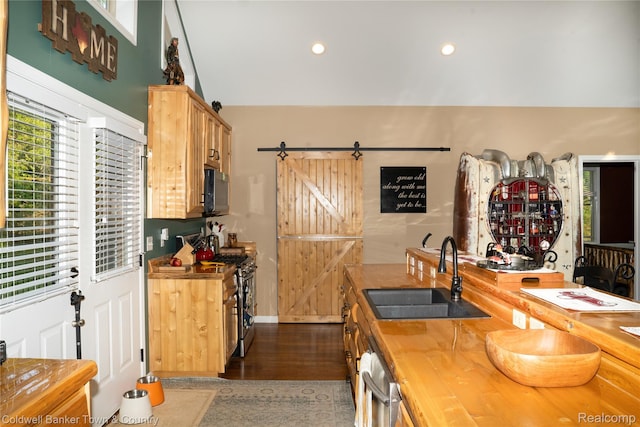 2223 Hidden Valley Rd, Howell, MI 48843 - kitchen featuring wood counters, appliances with stainless steel finishes, dark wood finished floors, and recessed lighting
