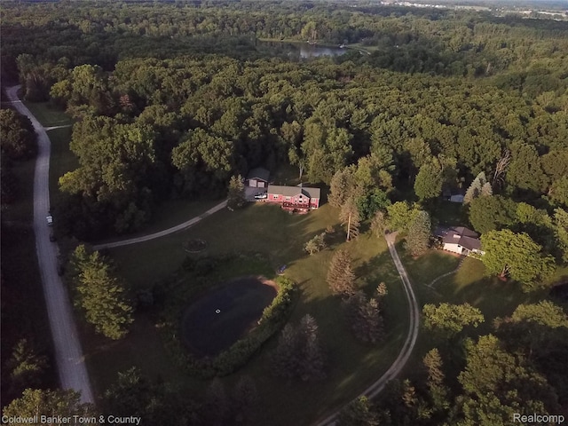 2223 Hidden Valley Rd, Howell, MI 48843 - aerial view of property and surrounding area with a heavily wooded area
