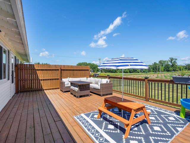 1140 Wing Dr, Ann Arbor, MI 48103 - deck with an outdoor living space and a lawn