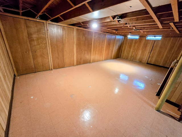 27751 Palomino Ave, Warren, MI 48093 - below grade area with wood walls and tile patterned floors
