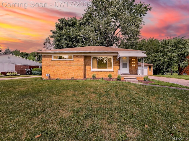 2314 Middlebelt Rd, West Bloomfield, MI 48324 - view of front of property featuring a yard, driveway, and brick siding