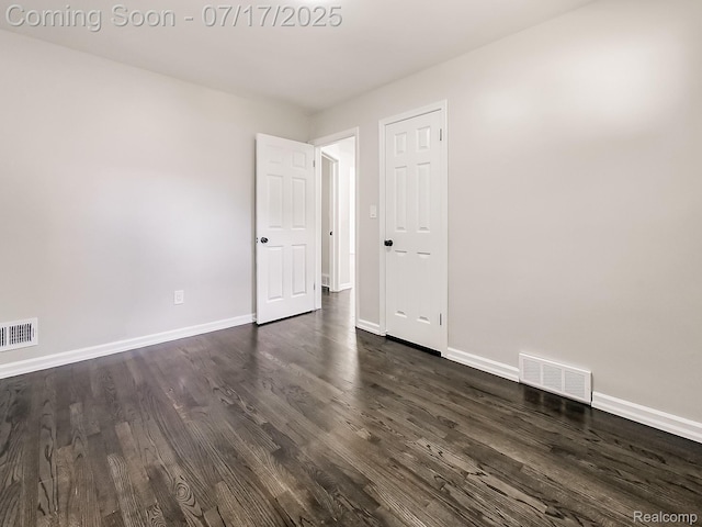 2314 Middlebelt Rd, West Bloomfield, MI 48324 - spare room featuring dark wood-style flooring and baseboards