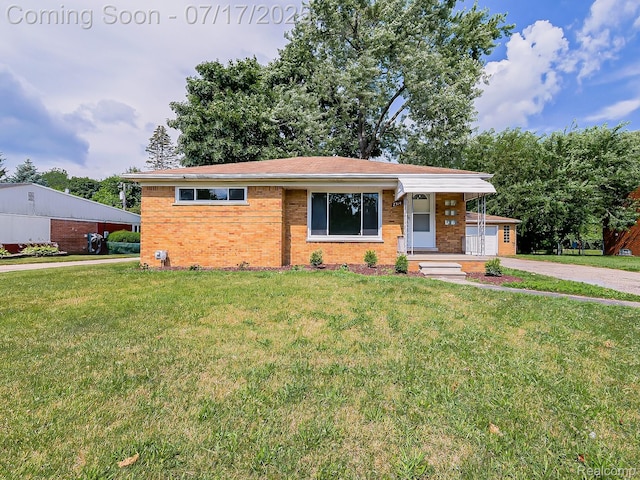 2314 Middlebelt Rd, West Bloomfield, MI 48324 - view of front of property featuring brick siding, a front yard, driveway, and a garage