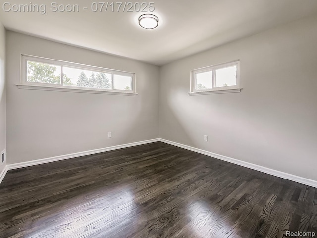 2314 Middlebelt Rd, West Bloomfield, MI 48324 - spare room with dark wood-style floors and baseboards