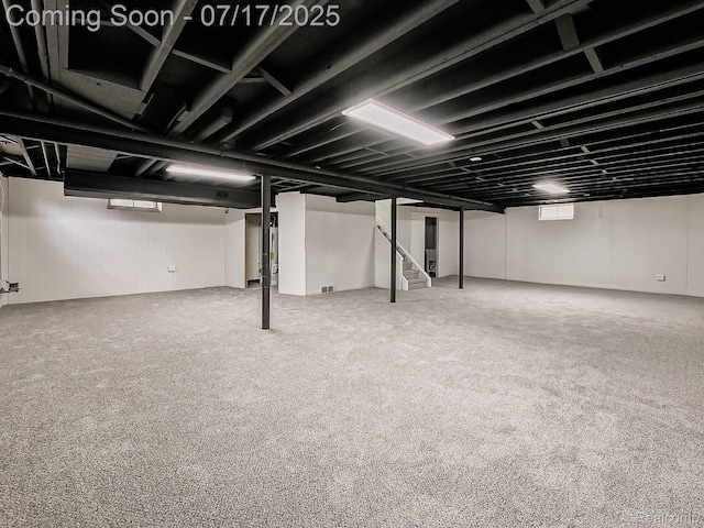 2314 Middlebelt Rd, West Bloomfield, MI 48324 - below grade area featuring stairway, healthy amount of natural light, and carpet