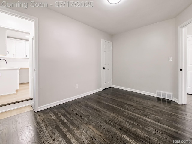 2314 Middlebelt Rd, West Bloomfield, MI 48324 - unfurnished room with dark wood-type flooring