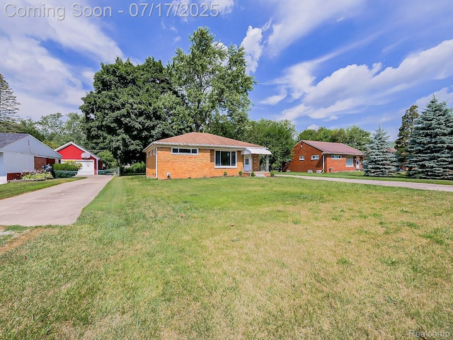 2314 Middlebelt Rd, West Bloomfield, MI 48324 - ranch-style house with a detached garage, a front lawn, an outdoor structure, and brick siding