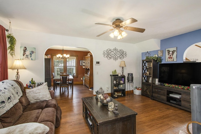 2136 Amherst Ave, Kalamazoo, MI 49008 - living area with arched walkways, a chandelier, a ceiling fan, and wood finished floors