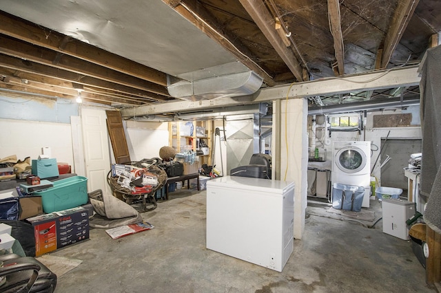 2136 Amherst Ave, Kalamazoo, MI 49008 - below grade area with washer / clothes dryer and fridge