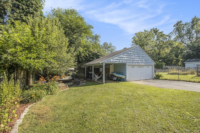 2136 Amherst Ave, Kalamazoo, MI 49008 - garage with asphalt driveway