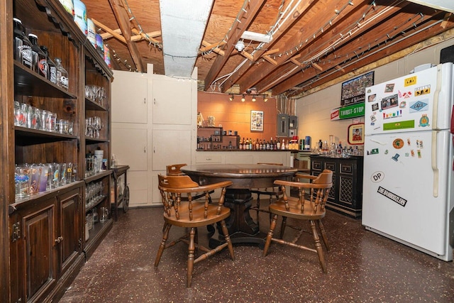 923 Par 4 Rd, Kalamazoo, MI 49008 - indoor dry bar featuring freestanding refrigerator and electric panel