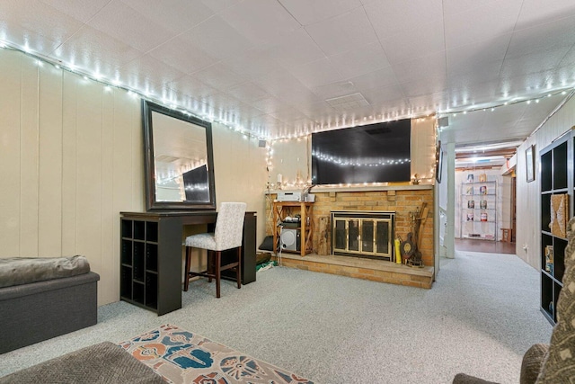 923 Par 4 Rd, Kalamazoo, MI 49008 - carpeted living room with a brick fireplace