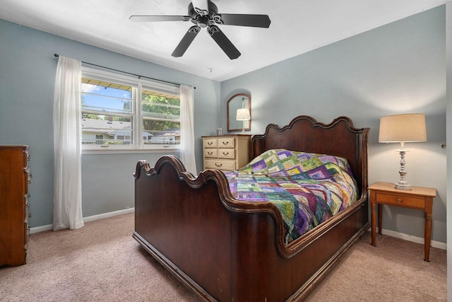 923 Par 4 Rd, Kalamazoo, MI 49008 - carpeted bedroom featuring baseboards and a ceiling fan