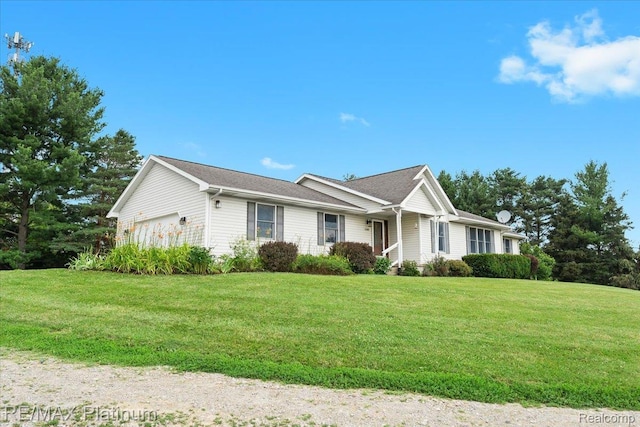 6893 Sanford Rd, Howell, MI 48855 - ranch-style home with an attached garage and a front yard